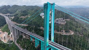 China's giant: World's tallest bridge opens over canyon