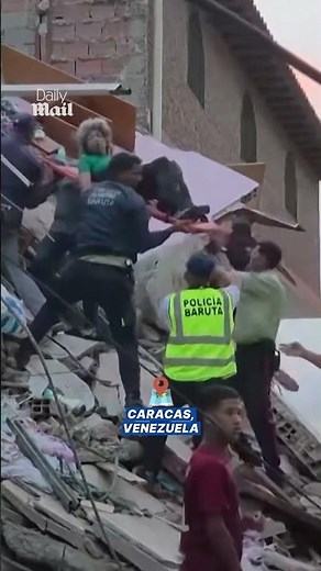 Rescue workers carry people out on stretchers after earthquake in Venezuela