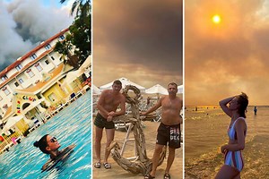 Selfie-lovers hit beaches despite 'apocalyptic' wildfires blotting out sun