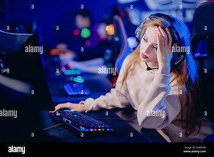 Facepalm streamer caucasian woman fail losing play gamer playing online video games computer emotions aggression, neon color Stock Photo - Alamy