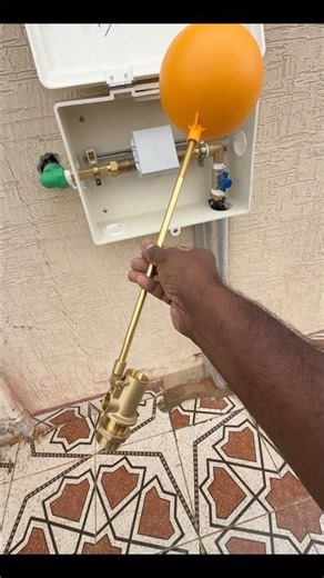 "New water line connection complete, float valve installed and ready to prevent overflows."plumbing