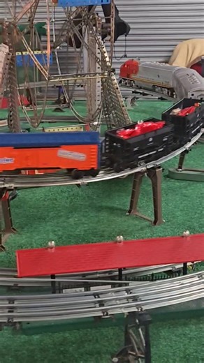 Lionel Santa Fe (ATSF) warbonnet F units pulling a freight train on a layout at the train show, 2025