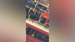 Croydon bus station crash: double-decker mounts pavement