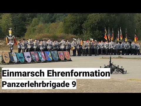 German armoured brigade celebrates with marching music - parade with troop flags