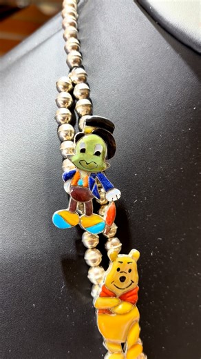 A very hard to find Zuni necklace with all the Disney Characters. This is in the shop now and definitely worth the time to stop by and take a look! Studio GL Creationz is located at 204 W. San Francisco Street, inside the RC Gorman Navajo Gallery. We are open seven days a week from 10 am to 5pm. Hope to see you soon!!! #studiog|collectionz #studiogl #g|miller #g|millerjewelry #g/studios #g|millerstudio #turquoise #coral #cabochons #santafe #santafeplaza #santafejewelry #santafejeweler #santafear