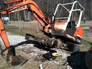 Jims Takeuchi #08 - Repairing the track motor.