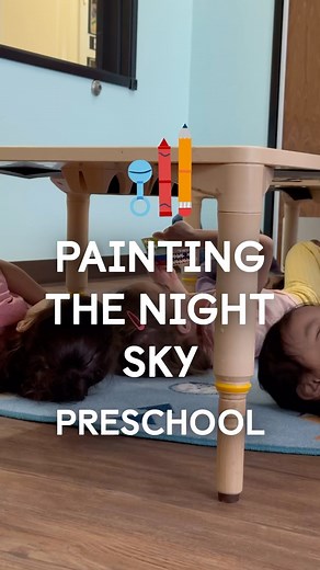 Our preschool classrooms are gearing up for a galactic adventure by turning art upside down to explore the night sky in a new, creative way 🌌 We have transformed tables into night sky hubs by taping Black construction paper underneath, so these little astronomers are ready to draw constellations ✨ This hands-on activity ignites their curiosity about astronomy while helping with ☑️ Cognitive development ☑️ Physical development ☑️ Executive function ☑️ Language & literacy ☑️ Creative expression B