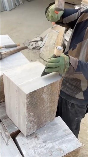 Stone Masonry Technique Using Chisel and Hammer to Split and Shape Large Blocks