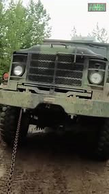Pulling an Army Truck Uphill!