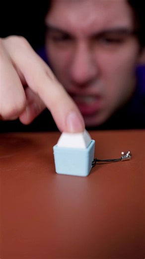 Galvanized steel keyboard! Check out the Funny Keycap Fidgets from Kinetic Labs for a fun clicky fidget that fits in your pocket! #officehumor #corporatehumor #comedy #mechanicalkeyboard