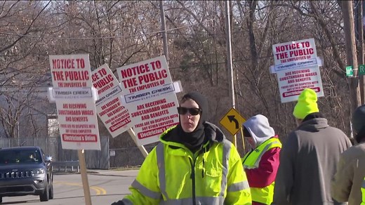 IBEW Local 8 members picketing outside former Rossford Lanes bowling alley