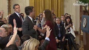 CNN White House reporter Jim Acosta has had his White House credentials revoked after engaging in a fiery exchange with Donald Trump. Acosta asked Trump about immigration and Trump refused to answer Acosta's questions, repeatedly telling him to sit down. Acosta initially refused to relinquish the microphone to a female intern and the White House Press Secretary Sarah Huckabee Sanders later tweeted that Acosta had placed his hands on the young woman. | The Guardian