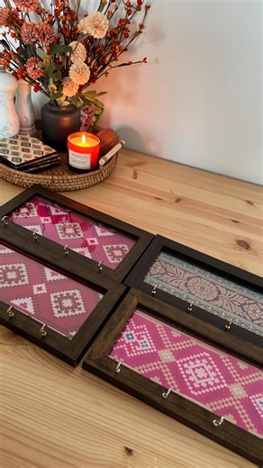 Once woven for royals, now crafted for your everyday 🪡✨ Our fabric key holder carries stories of artistry, patience and pride. It’s more than just a place for your keys… it’s a piece of living art 🗝️💛 🛒 Shop now on decorradesigns.ca (LINK IN BIO) #HandcraftedWithLove #BrocadeStories #DecorWithSoul #LivingArt #HomeDecor #KeyHolder #DesiVibes #Desi | Decorra Home & Designs