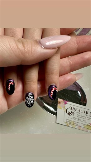 ✨ Holiday Magic on Every Nail ✨ Today’s set is serving all the cozy Christmas vibes — sparkling winter purple, hand-painted snowflakes, and the cutest candy-cane accents! ❄️ Perfect for anyone ready to sleigh their holiday look. Created with love at Beautify Nails & Lashes ✨ | Beautify Nails and Lashes | Facebook