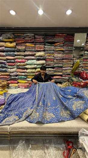 DULARI on Instagram: "✨ One Lehenga. One Bride. No Repeat. ✨ 💙 Peacock Handwork Bandhani Lehenga 💙 Rich peacock handwork with classic bandhani dot design — made for brides who choose exclusivity. ✔️ Single piece only – made once ❌ No restock | ❌ No remake 👚 Unstitched blouse 🧣 2.5 metre heavy work dupatta Perfect for wedding functions & royal bridal looks 💫 📲 WhatsApp for price, video call shopping & worldwide delivery: +91 98981 14279 | +91 93135 94459 | +91 96649 68988 #bandhanilehenga #