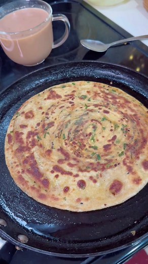 Traditional Indian Flatbread Preparation: Roti and Paratha