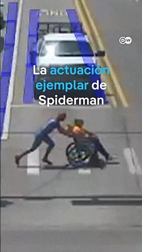 "Spider-Man" doesn't hesitate to jump out of his car and help a man in a wheelchair cross the street