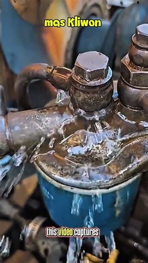 Loosening the Bolt on a Diesel Engine Fuel Filter#shorts #automotive #mechanic #satisfying #repair