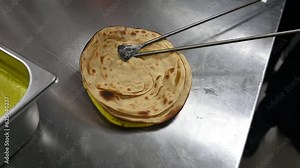 Freshly made tandoor bread is baked in a clay oven and served with Indian and Asian cuisines.
