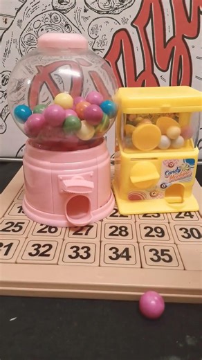 Large pink gumball candy machine dispenser with yellow candy machine #satisfying #shorts