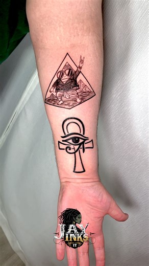 Jay Inks It on Instagram: "Just finished this epic Egyptian pyramid tattoo right above the Eye of Horus! 🏺✨ 🗣️Yes, happy clients come back for more ink when you’re able to bring their ideas to life 🤞🏾 This design is an absolute showstopper, featuring a dynamic pyramid wrapped in a stylish leather jacket. With hands raised and rockin’ that classic gesture 🤘, it’s all about channeling that energy! The intricate detail of the pyramid against the bold Eye of Horus below creates a perfect harmon