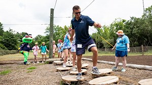 New Low Ropes Course Encourages Girl Scouts to TAKE LEAPS! Cole Sillinger & Stinger Cut the Ribbon!