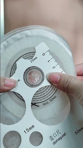 how to attach a one piece urostomy bag?