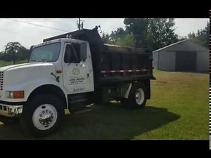 Delivering a load of topsoil in my 91 International 4700 Dump Truck