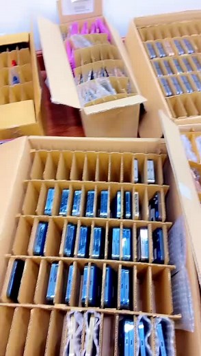 Mobile Phones in Cardboard Boxes: An Organized Collection