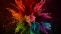 Colored powder explosion on black background. Super slow motion, 4K.