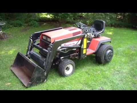 Simplicity Sunstar 20 with a loader, tiller, mower, snowblower