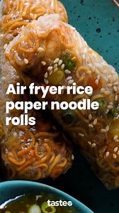 We’ve combined two of our favourite things – instant noodles and rice paper rolls – and turned them into something a little special! For the full recipe, Google “Taste air fryer rice paper noodle rolls”. Recipe by @amira_georgy_ #ricepaperrolls #airfryerrecipes #airfryerrecipe #airfryercooking | Taste.com.au
