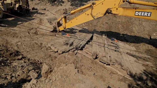 This excavator was so stuck it should not have been possible