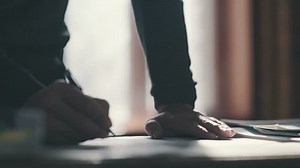Close-up Man Bends Over Desk Makes Stock Footage Video (100% Royalty-free) 25203713 | Shutterstock