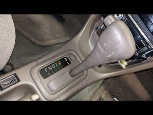 How to remove and install shifter trim on a 1999 Chevy Prizm / Toyota Corolla