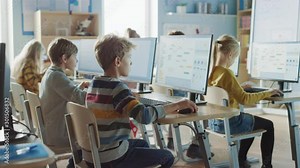 Elementary School Computer Science Classroom: Smart Little Schoolchildren Work on Personal Computers, Learn Programming Language for Software Coding. Schoolchildren Getting Modern Education