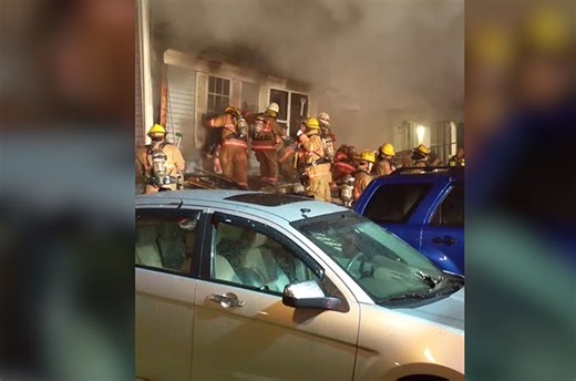 Terrifying moment a building collapses on firefighters