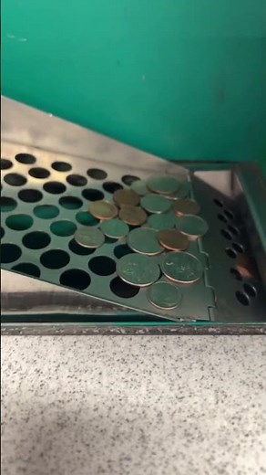 Putting coins in coinstar!
