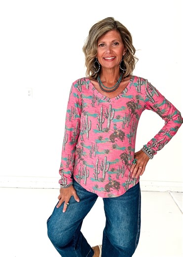 Rolling Ranch Boutique | Western Boutique on Instagram: "💕🐎 BLUSH & BRONCS TOP 🐎💕 This one is SO dang cute in person 😍 That blush pink + broncs + cactus combo is just chef’s kiss. ✔️ XS–3X ✔️ Lightweight ribbed fabric (easy, comfy) ✔️ Flattering V-neck ✔️ Perfect now → straight into spring It’s one of those throw-on-and-go tops that still looks put together… whether you’re headed to town or feeding horses first 🐴😉 📲 There is a free shipping over $20 code on the app 🚚 Ships fast from Min