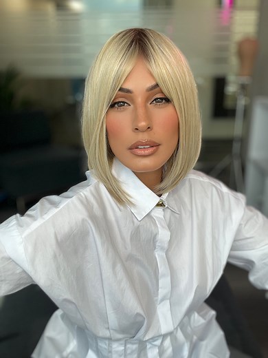 9.6K views · 41 reactions | The cutest little bob just launched ‍♀️ Roxie is wearing Paige by Envy in Silky Beige. With a blend of human hair and heat-friendly synthetic fibers, this style can be customized or worn straight out of the box!  If you don’t want the upkeep of long hair, this style is the perfect length for a chic, effortless look! Would you wear this bob? Comment “Paige” and we’ll DM you the link ️ | Wigs.com | Facebook
