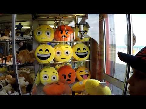 CUTE EMOJI PILLOW CLAW MACHINE WIN