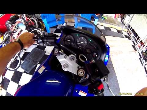 Katana 600 modifications with handlebar risers and frame sliders
