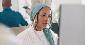 Video call, computer and laughing Islamic woman talking, speaking and chat to online business contact. Communication, funny conversation and Muslim employee discussion, networking and laugh at joke