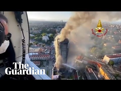 Flames engulf residential tower block in Milan