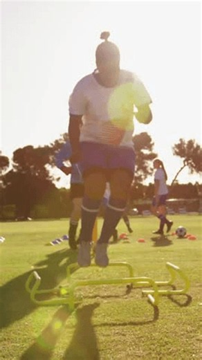 clip-4170954517-training-on-grassy-field-soccer-players-using