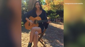 Scout Willis strums guitar and sings before social media break