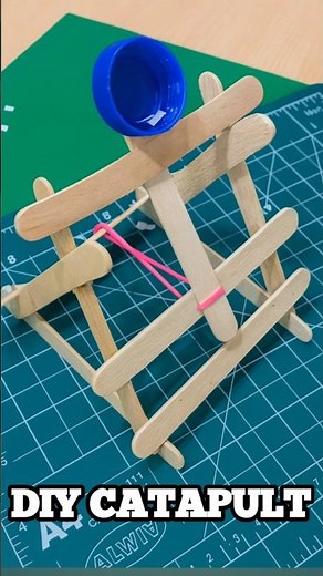 Diy a simple catapult at home using some ice cream sticks/ popsicle sticks. #shorts #diy #experiment
