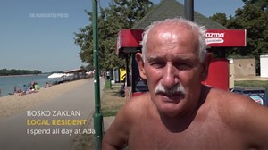Serbians flock to the shores of Ada Ciganlija artificial lake to escape predicted extreme high temperatures