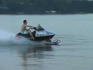Snowmobiling stunt. Lake Okoboji cam 1