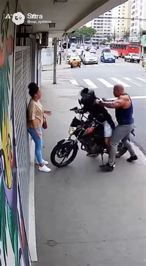 A muscular man saves a woman #assault #robbery #slum #community